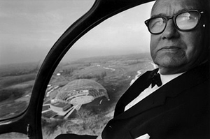 Image of Buckminster Fuller in a helicopter.